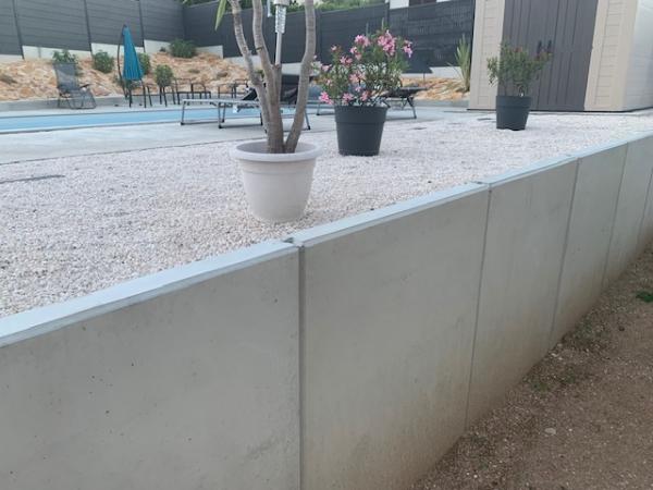 FOURNITURE ET POSE DE MURS EN L POUR MURS DE SOUTAINEMENT